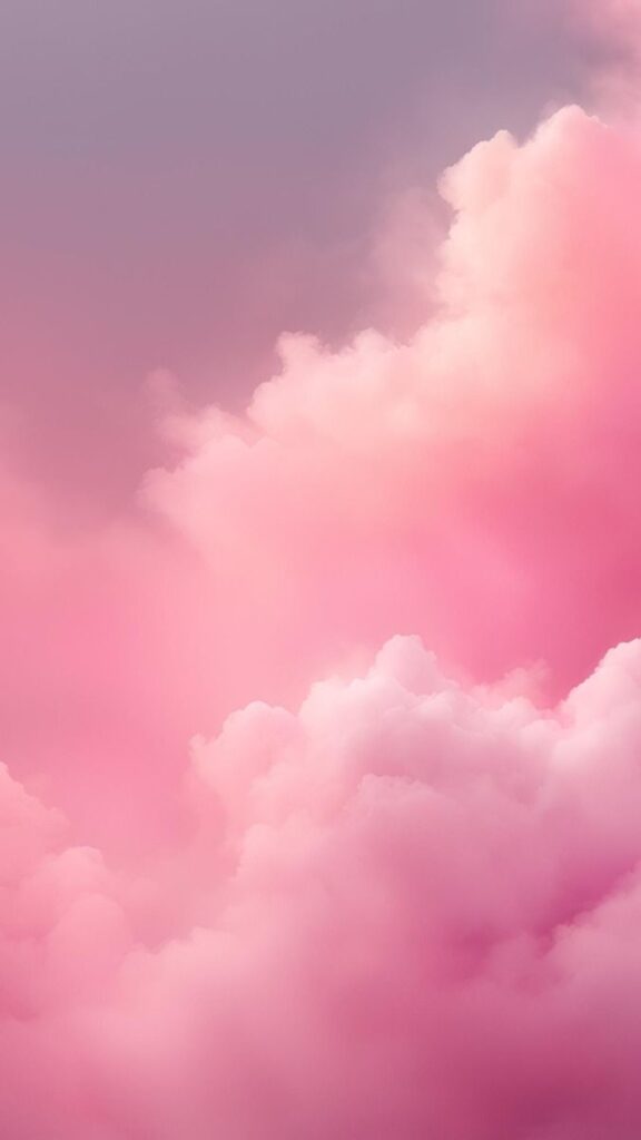 Soft pink clouds in the sky at sunset, creating a dreamy, serene atmosphere.