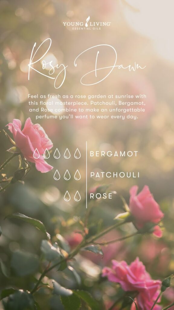 Essential oils blend image featuring roses with bergamot and patchouli notes; text reads Rosy Dawn for floral perfume.