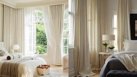 Elegant bedroom with large windows, white curtains, and cozy bedding, offering a serene and inviting ambiance.