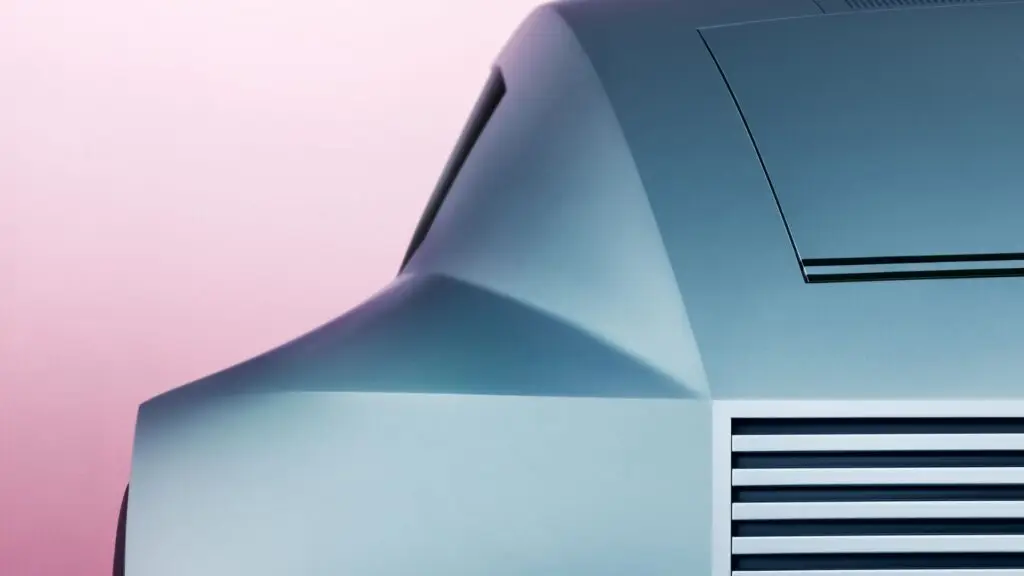 Futuristic car design with sleek lines and vents on a pastel gradient background.