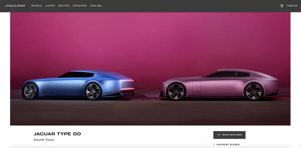 Futuristic blue and pink Jaguar Type 00 cars against a vibrant pink background.