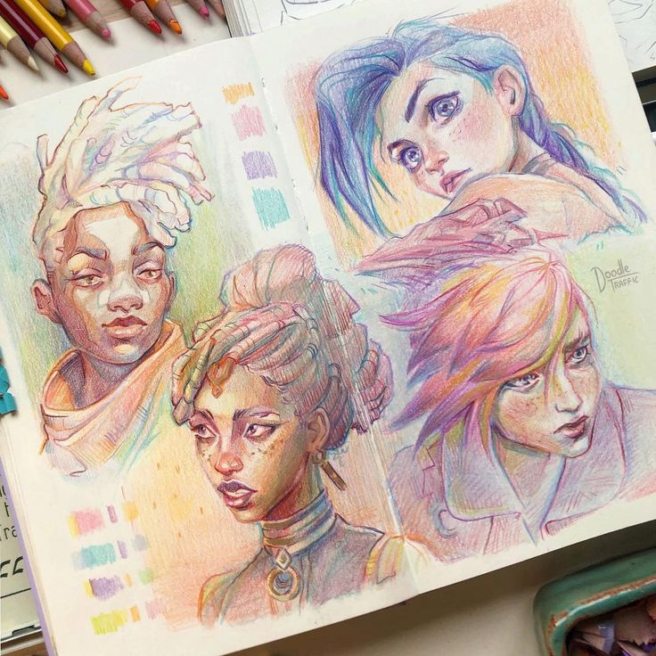 Colorful sketchbook page featuring four vibrant character portraits in pencil, showcasing artistic creativity.