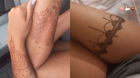 Henna designs on arms and thigh, showcasing intricate mehndi patterns for a stylish look.