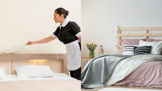 Hotel maid dusting a bed beside a cozy, neatly made bed with pillows and blankets.