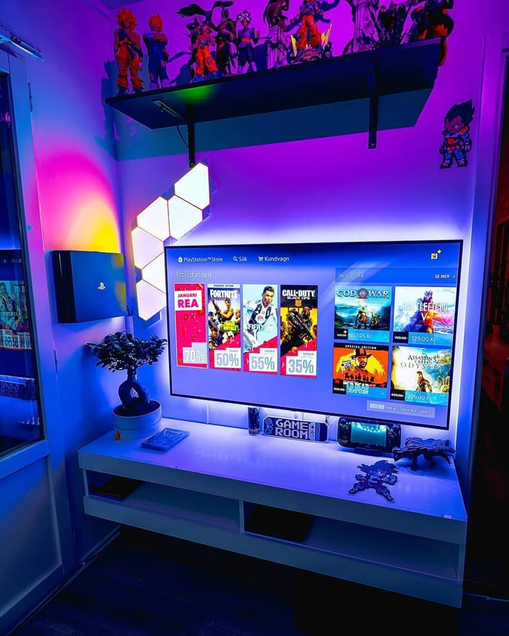 Colorful gaming setup with LED lights, featuring a PlayStation console, screen, and action figures on shelves.