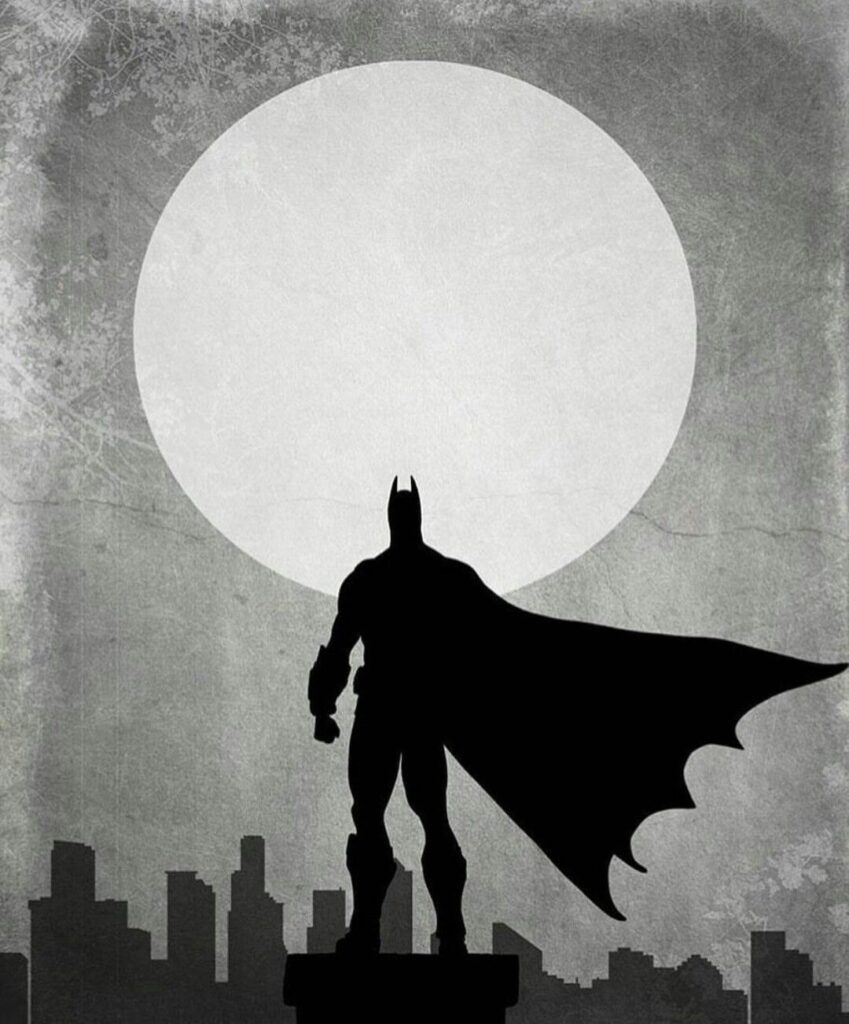 Silhouette of a superhero with cape standing in front of a large moon, city skyline in the background, monochrome style.