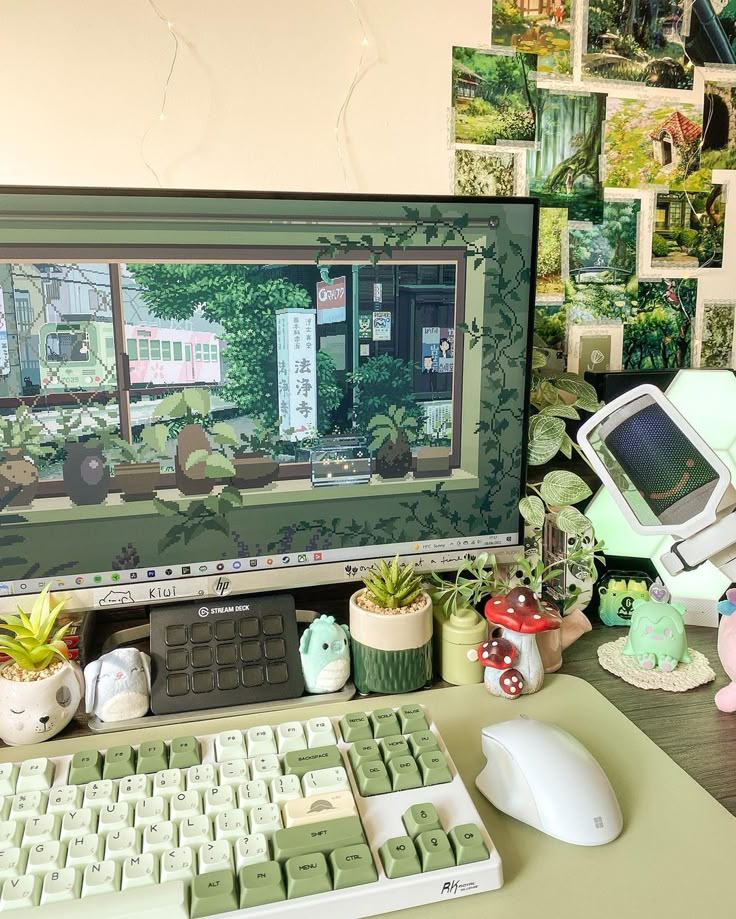 Cozy desk setup with green keyboard, potted plants, cute decor, and pixel art on computer screen.