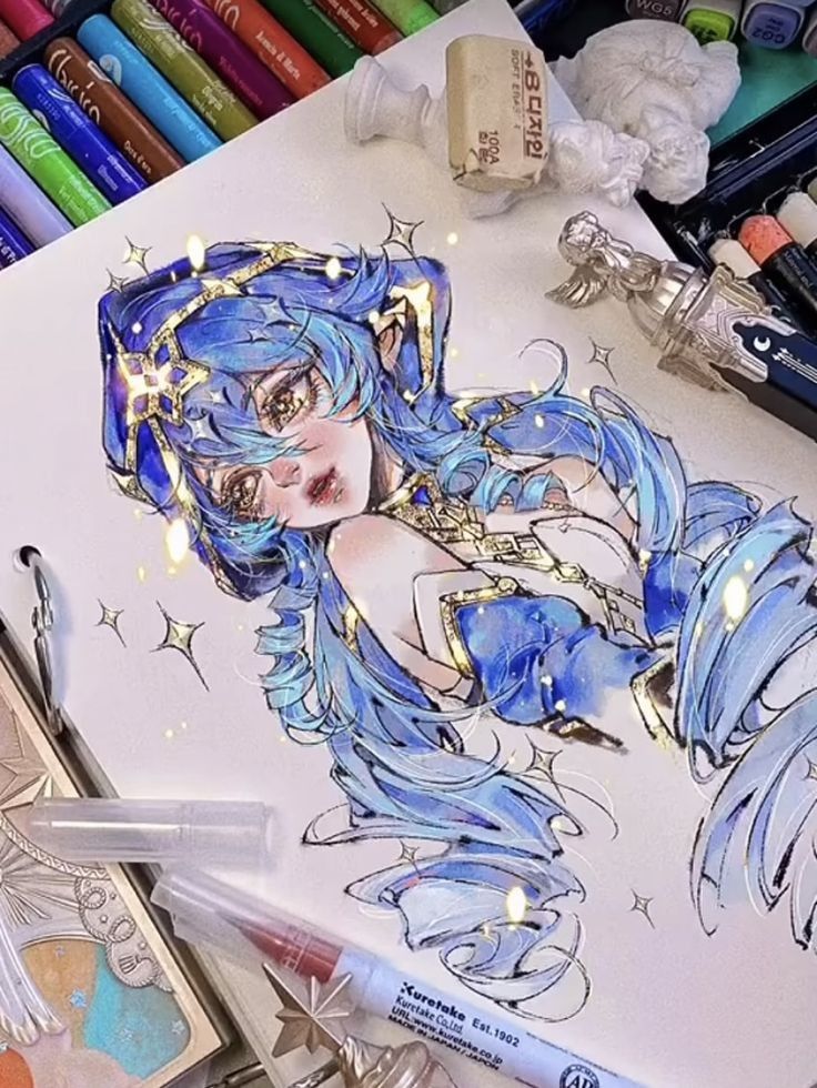 Drawing of a fantasy character with blue hair and outfit, surrounded by art supplies like markers and stamps.