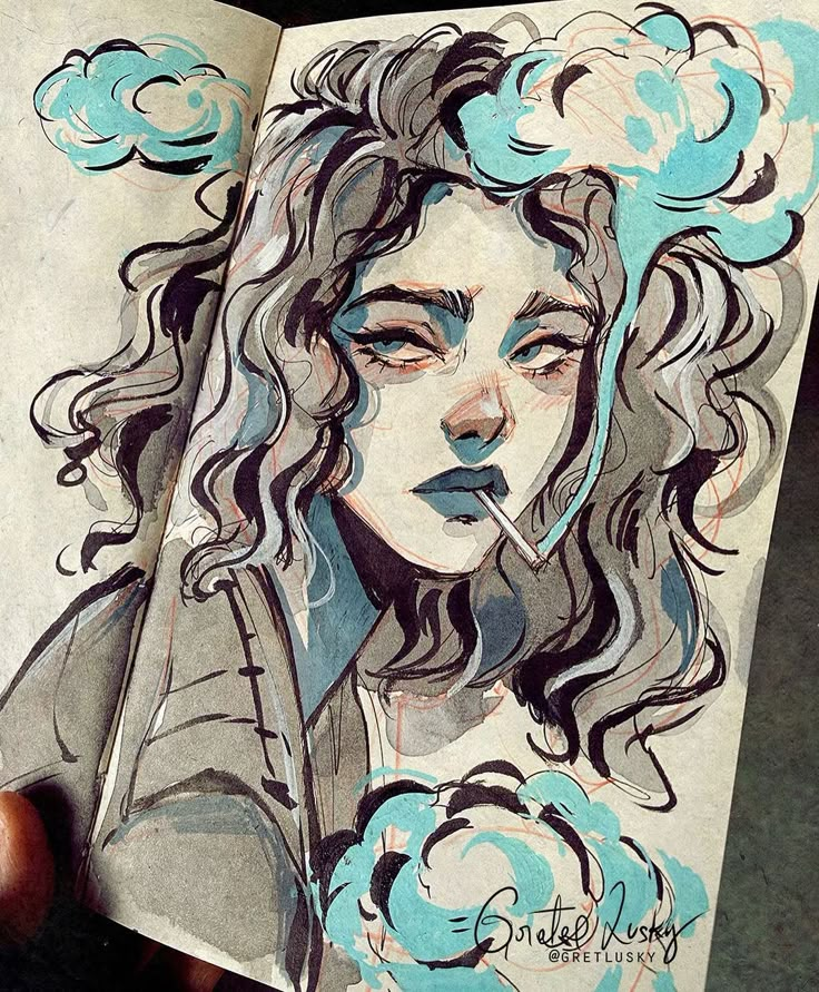 Artistic portrait of a woman with curly hair and moody expression, surrounded by blue smoke-like patterns.