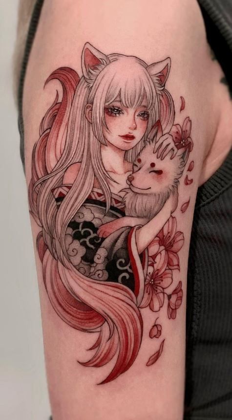 Anime-style tattoo of a fox girl with long hair and fox features, holding a smiling mask, surrounded by flowers.