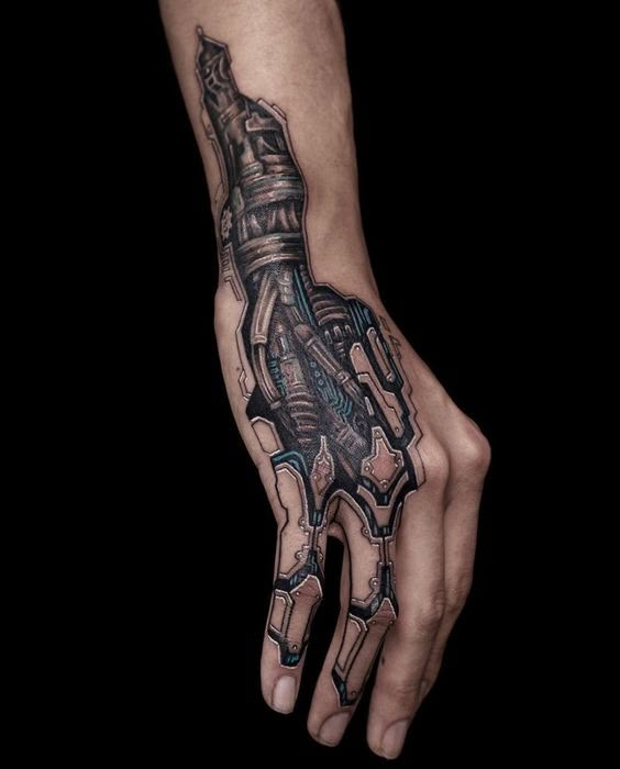 Intricate biomechanical tattoo design on a hand with mechanical and futuristic elements.