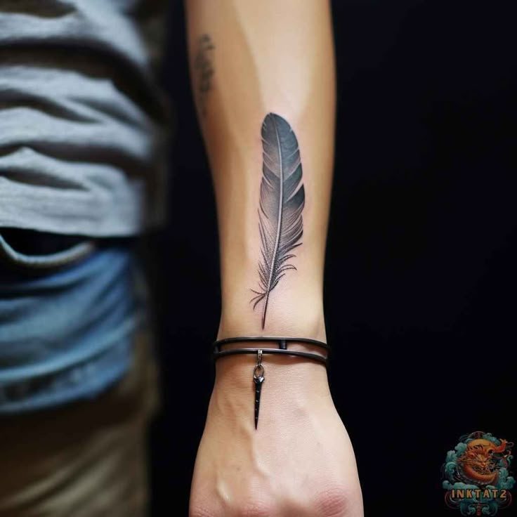 Feather tattoo on forearm with bracelet, displaying detailed ink art and modern accessory style.