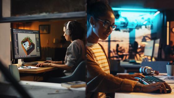 Two people working on computers in a creative office environment, focusing on design projects with modern technology.