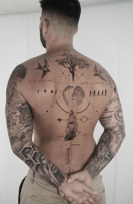 Man with intricate themed back tattoo featuring evolution, nature, and space designs.