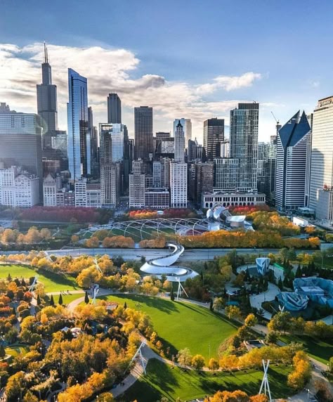 3aa2f980fe047c03e6c11450b99bee6f Aerial view of a vibrant city skyline with a green park in autumn, showcasing tall buildings and clear blue sky. | Sky Rye Design Aerial view of a vibrant city skyline with a green park in autumn, showcasing tall buildings and clear blue sky.