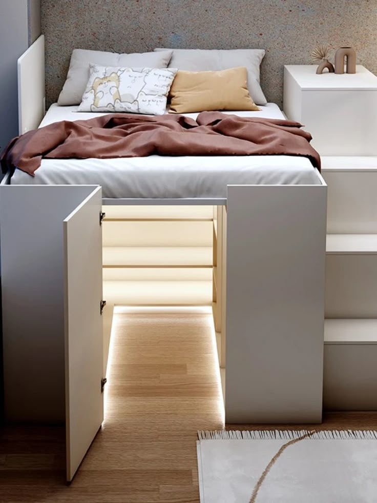 Modern bed with built-in storage and stair access, featuring cozy bedding and under-bed lighting.