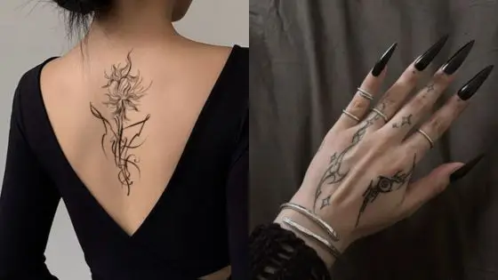 Aesthetic temporary tattoo ideas Back tattoo of a floral design and hand tattoos with rings and black nails, showcasing artistic ink style. | Sky Rye Design Back tattoo of a floral design and hand tattoos with rings and black nails, showcasing artistic ink style.