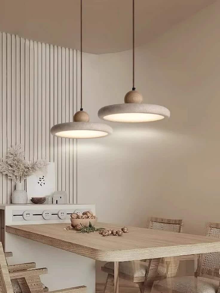 Afralia™ UFO Round Pendant Chandelier in Walnut Wood Finish for Bedroom and Restaurant_ - Log wood color 40cm _ 4000K Minimalist dining room with wooden table, hanging pendant lights, and neutral decor accents for a cozy ambiance. | Sky Rye Design Minimalist dining room with wooden table, hanging pendant lights, and neutral decor accents for a cozy ambiance.