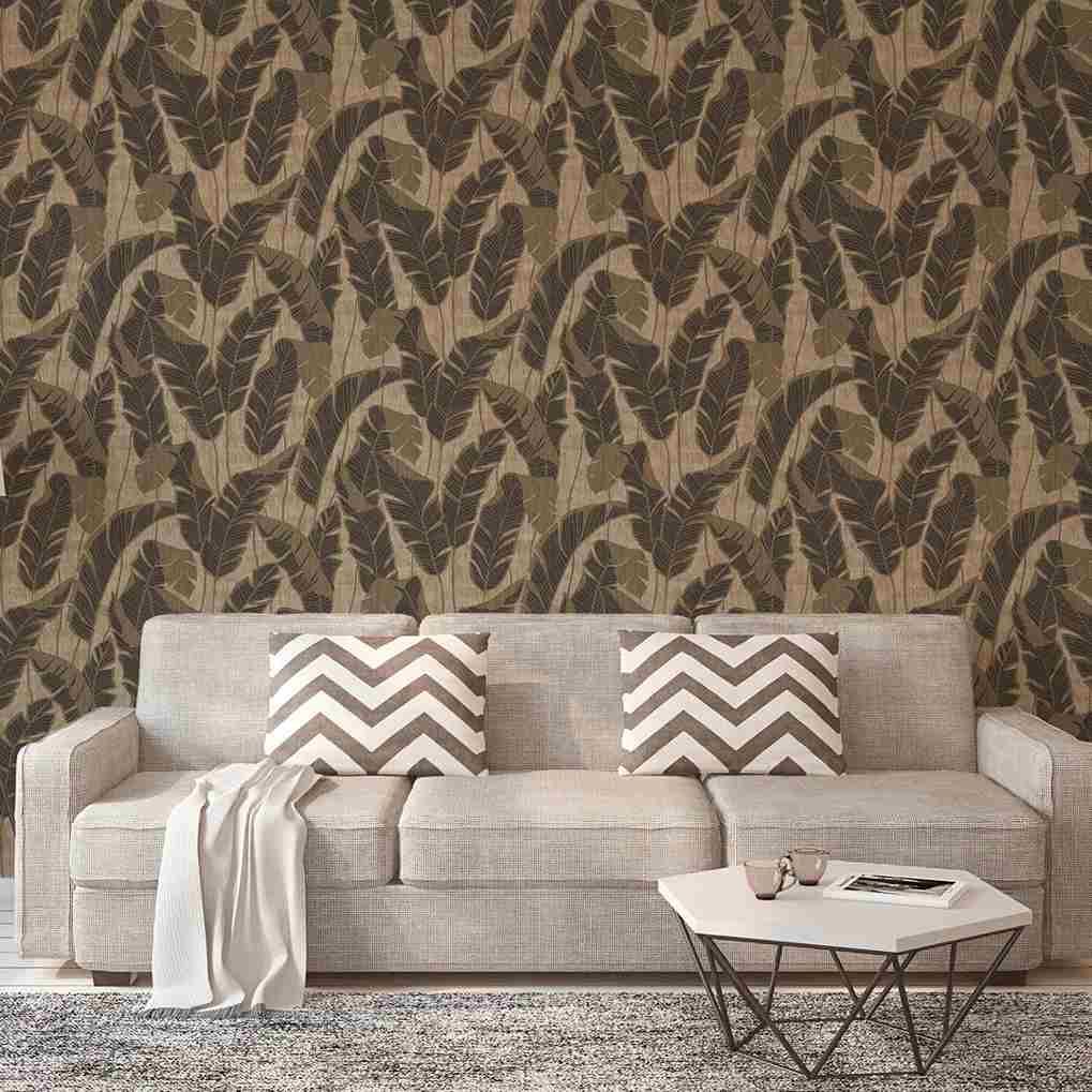 Modern living room with beige sofa, chevron throw pillows, leafy wallpaper, and coffee table.