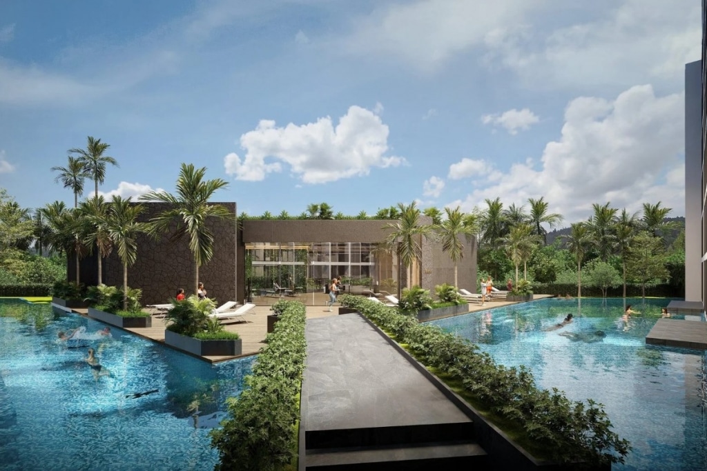 Modern luxury pool area with palm trees, sun loungers, and a sleek building, under a blue sky with fluffy clouds.