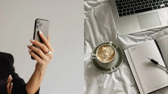 The Future of Content Marketing Person holding smartphone near laptop, coffee, and open notebook on bed, ready for remote work or study. | Sky Rye Design Person holding smartphone near laptop, coffee, and open notebook on bed, ready for remote work or study.
