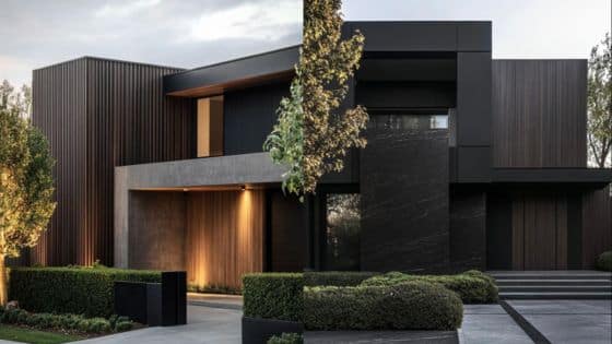 Viewing Deck Blog 14 Modern architectural home with sleek lines, dark facade, large windows, and landscaped garden. | Sky Rye Design Modern architectural home with sleek lines, dark facade, large windows, and landscaped garden.