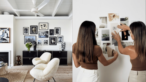 Modern living room with gallery wall art and two women arranging photo collage on a white wall.