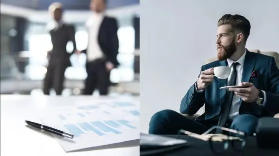 Viewing Deck Blog-6 Businessman with coffee, looking thoughtful, seated beside blurred office scene with graphs and discussions. | Sky Rye Design Businessman with coffee, looking thoughtful, seated beside blurred office scene with graphs and discussions.