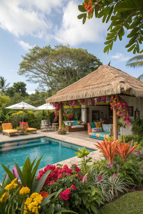 Tropical backyard oasis with pool, vibrant flowers, thatched gazebo, and lounge chairs for relaxation.