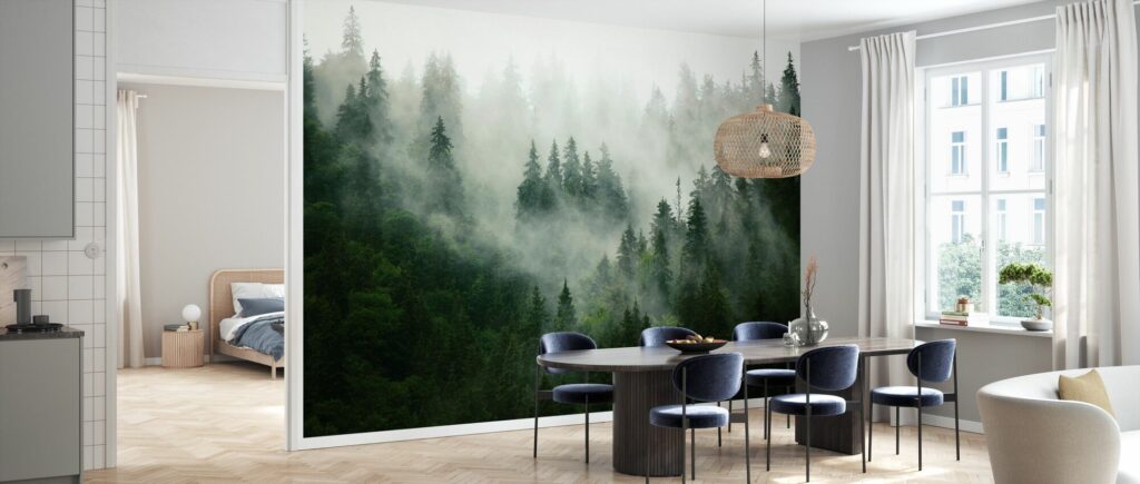 Dining room with forest mural, modern decor, and natural light from window.