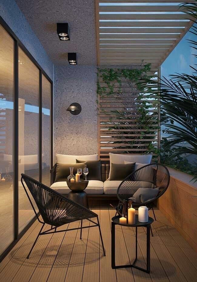 0d578394dd503acc31386012cbba05ee Cozy modern balcony with seating, candles, and greenery, providing a relaxing outdoor escape at twilight. | Sky Rye Design Cozy modern balcony with seating, candles, and greenery, providing a relaxing outdoor escape at twilight.