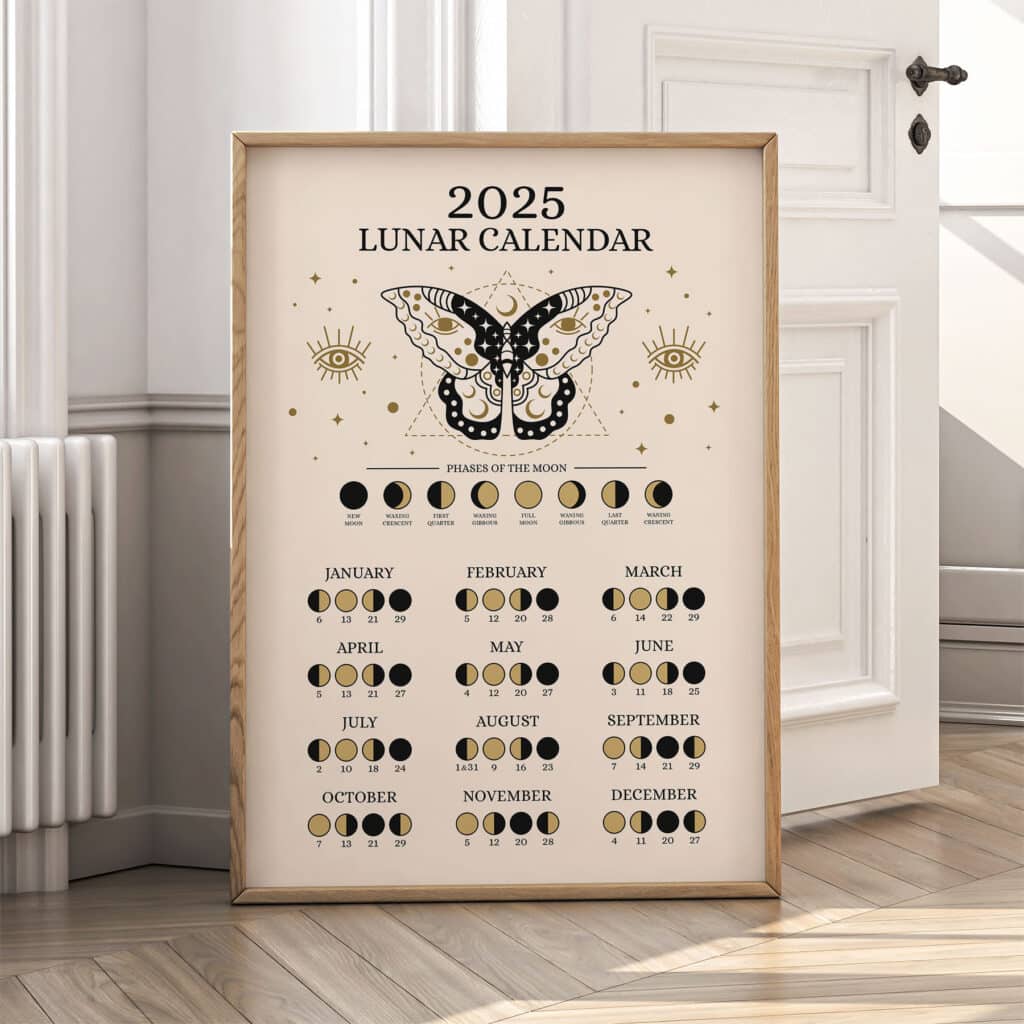 2025 framed lunar calendar with moon phases, butterfly design, and monthly dates in a bright interior setting.