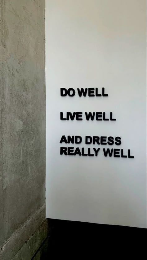 Inspirational wall quote: Do well, live well, and dress really well in modern black letters on white background.