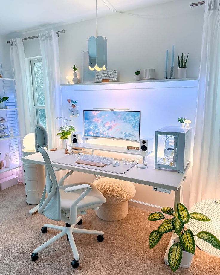 Modern minimalist home office setup with white desk, ergonomic chair, large monitor, and ambient lighting.