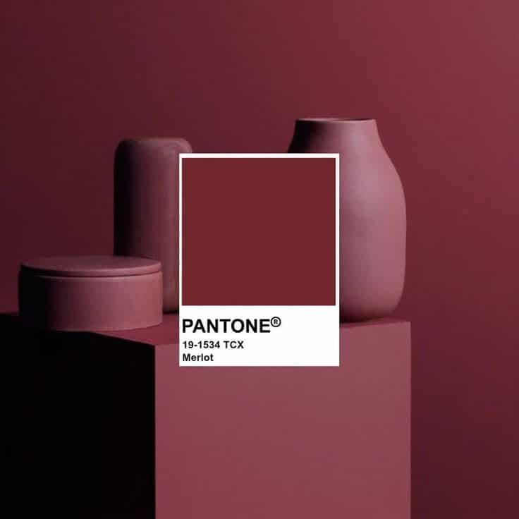 _ 18 Pantone 19-1534 TCX Merlot color swatch with matching vases on a deep red background. | Sky Rye Design Pantone 19-1534 TCX Merlot color swatch with matching vases on a deep red background.