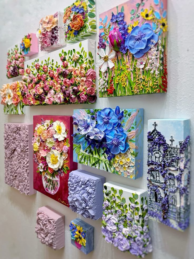 1ddeb257-752c-4dc5-9a02-ab46983c481c Colorful 3D floral paintings displayed on a wall, featuring vibrant and intricate flower designs in various sizes. | Sky Rye Design Colorful 3D floral paintings displayed on a wall, featuring vibrant and intricate flower designs in various sizes.