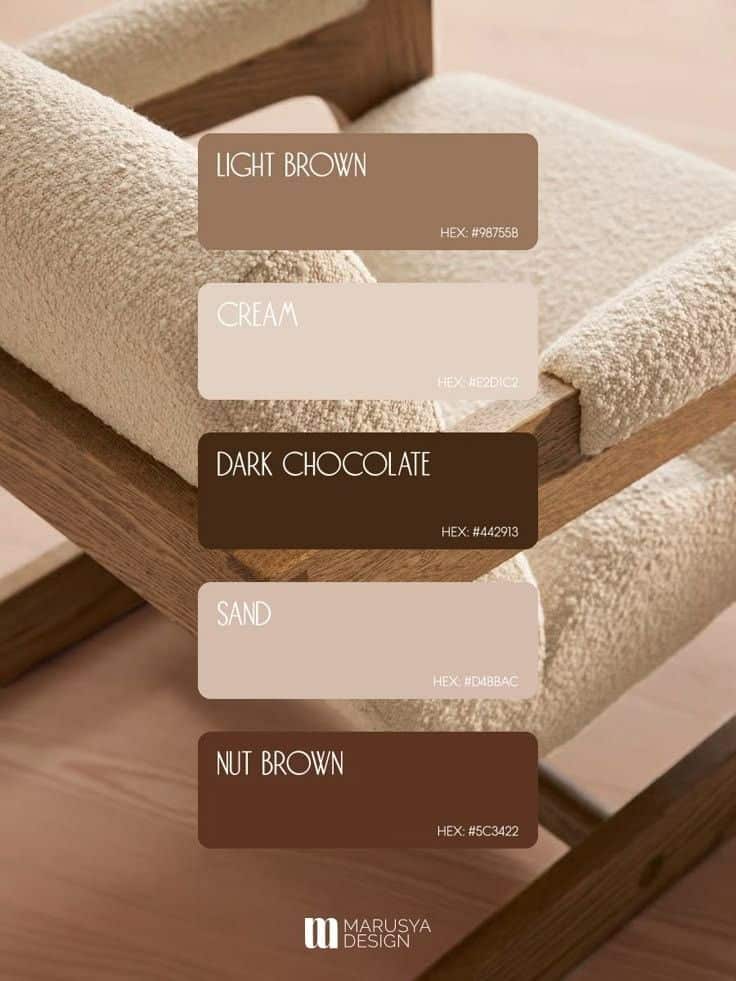 Color palette swatches on textured fabric, featuring light brown, cream, dark chocolate, sand, and nut brown tones.