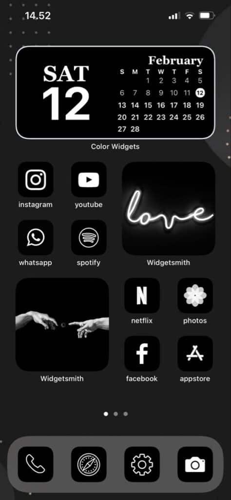 Black iPhone home screen with calendar widget, app icons for social media and love-themed images.