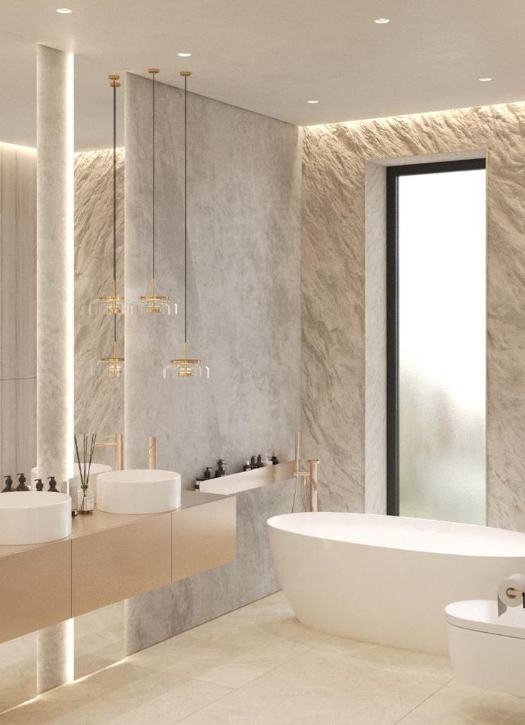 Luxurious modern bathroom with freestanding tub, double sinks, and stone walls. Elegant interior design.