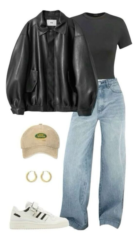 Trendy outfit with black leather jacket, black tee, light jeans, white sneakers, beige cap, and gold hoop earrings.