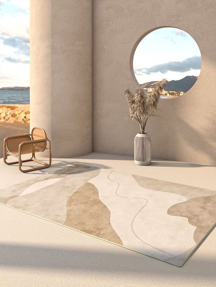 Modern living room with abstract rug, round window, coastal view, and stylish chair for serene ambiance.