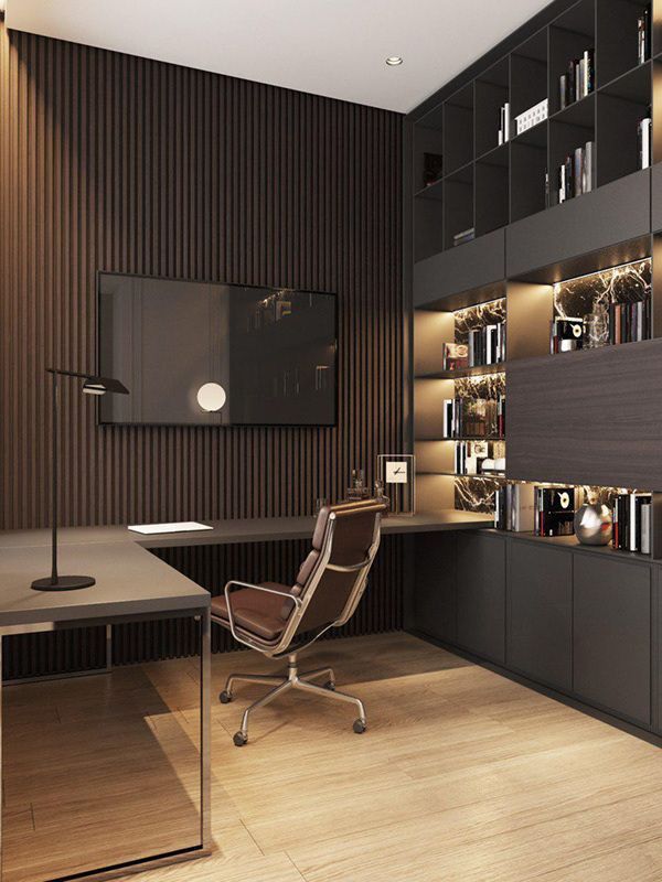 Modern home office with sleek desk, leather chair, and wall-mounted shelves in stylish wood-paneled design.