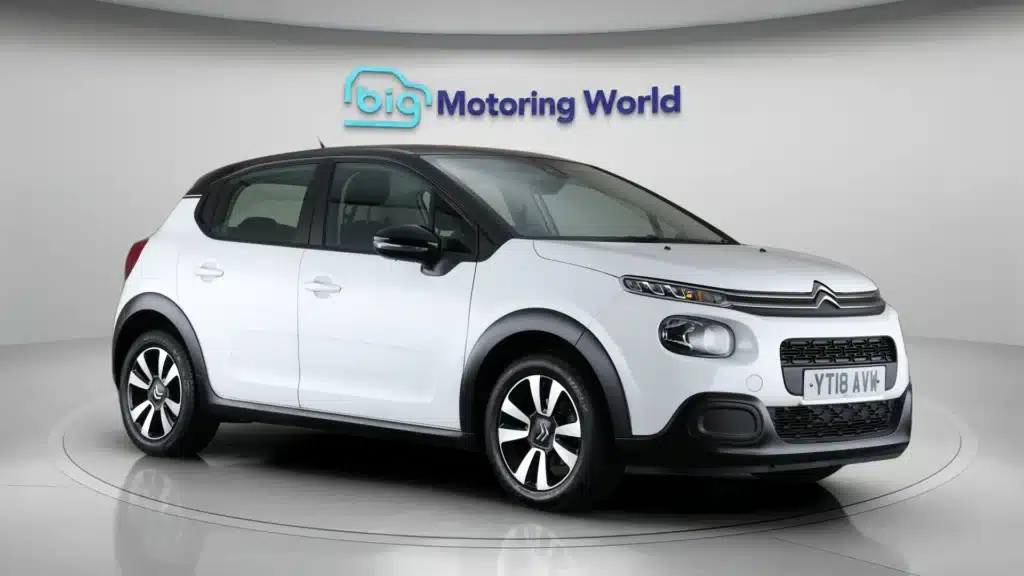 7 White Citroën car displayed indoors at Big Motoring World dealership. | Sky Rye Design White Citroën car displayed indoors at Big Motoring World dealership.