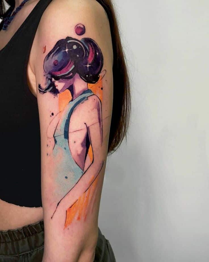 Colorful abstract tattoo of a woman on arm, featuring vivid hues and artistic design.