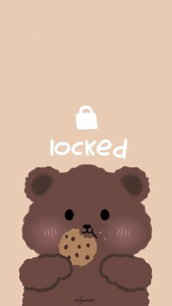 Cute cartoon bear holding a cookie under a locked symbol on a beige background.