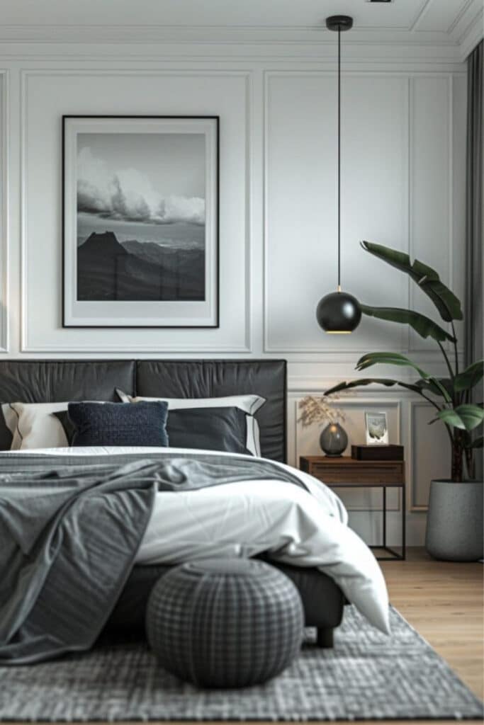8d0761ac1581f015ceaab352abe07af1 Modern bedroom with gray bedding, framed artwork, pendant light, and indoor plant for stylish interior design. | Sky Rye Design Modern bedroom with gray bedding, framed artwork, pendant light, and indoor plant for stylish interior design.