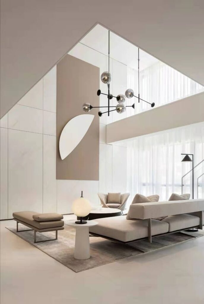 Modern living room with minimalist design, elegant chandelier, neutral tones, and large windows.