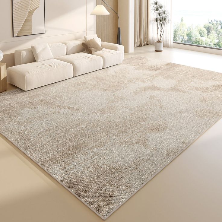 Modern living room with beige sofa and large textured area rug, bright natural light from floor-to-ceiling window.