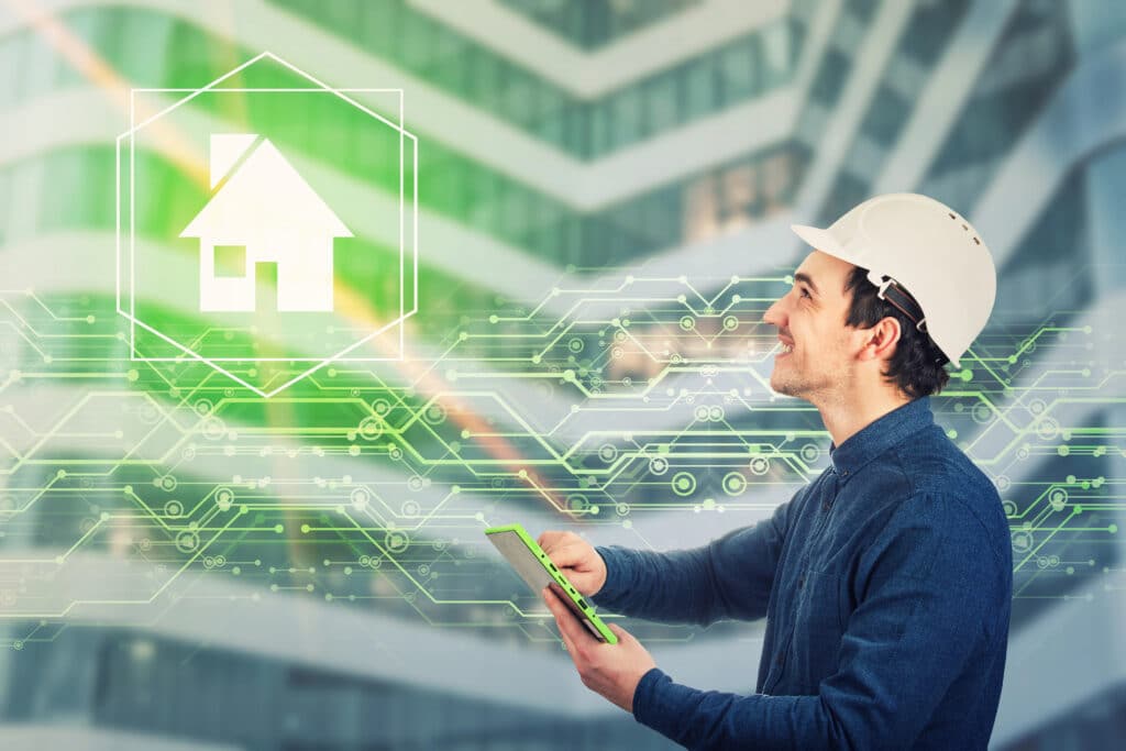 Engineer using tablet for smart home technology amidst digital circuit overlay.