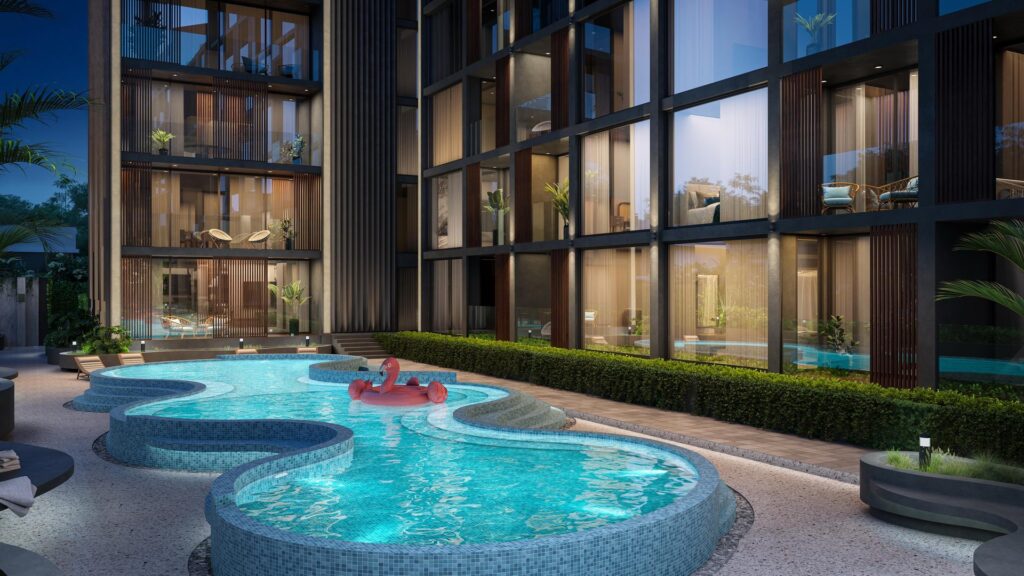 Modern apartment with illuminated pool and chic patio seating at night.